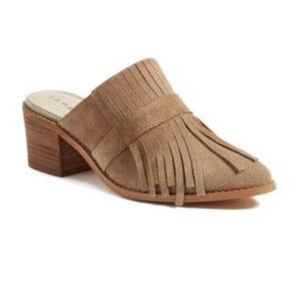 Hinge fringe mules. Never been worn.